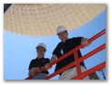 Stef and Garrett climbing aboard the DSS-14 structure