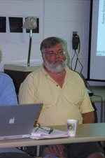 Fig. 11 Jay Melosh (U. Arizona) listens to discussion about the impact and post impact sequence.